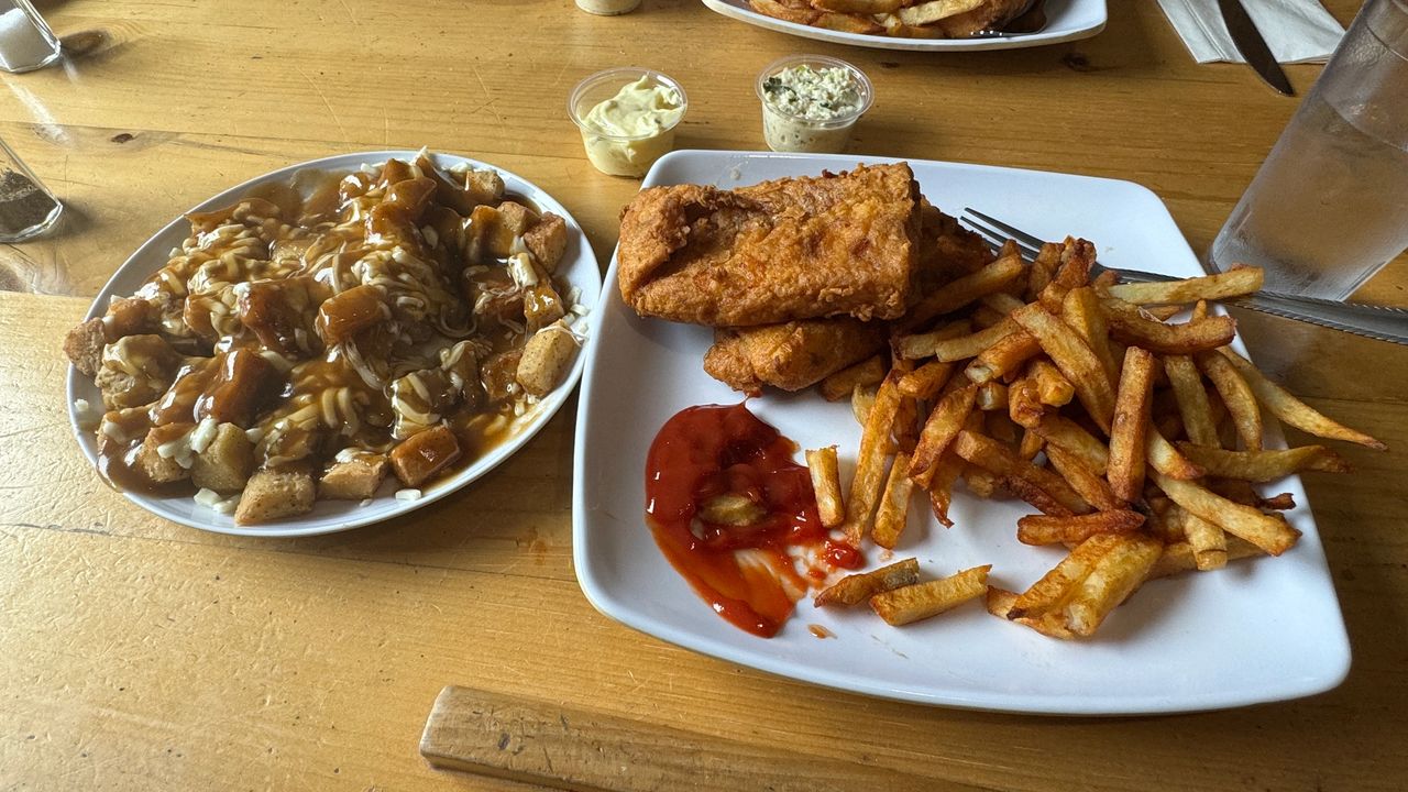 Canadian Dish - Poutine (Left) Fish n Chips (right)