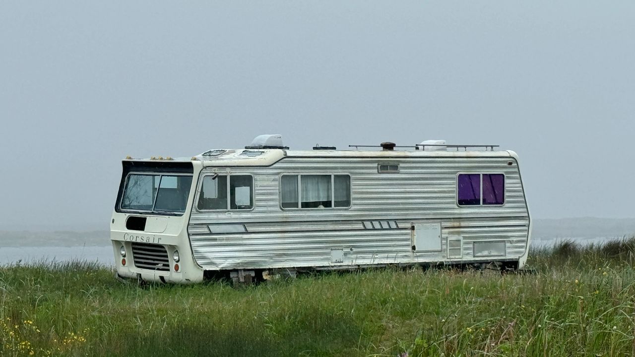 Old motor home on the berach